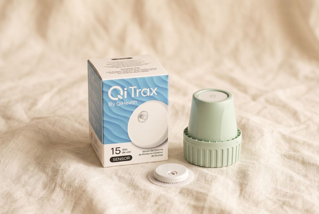 Caja de QiTrax con su aplicador y el sensor